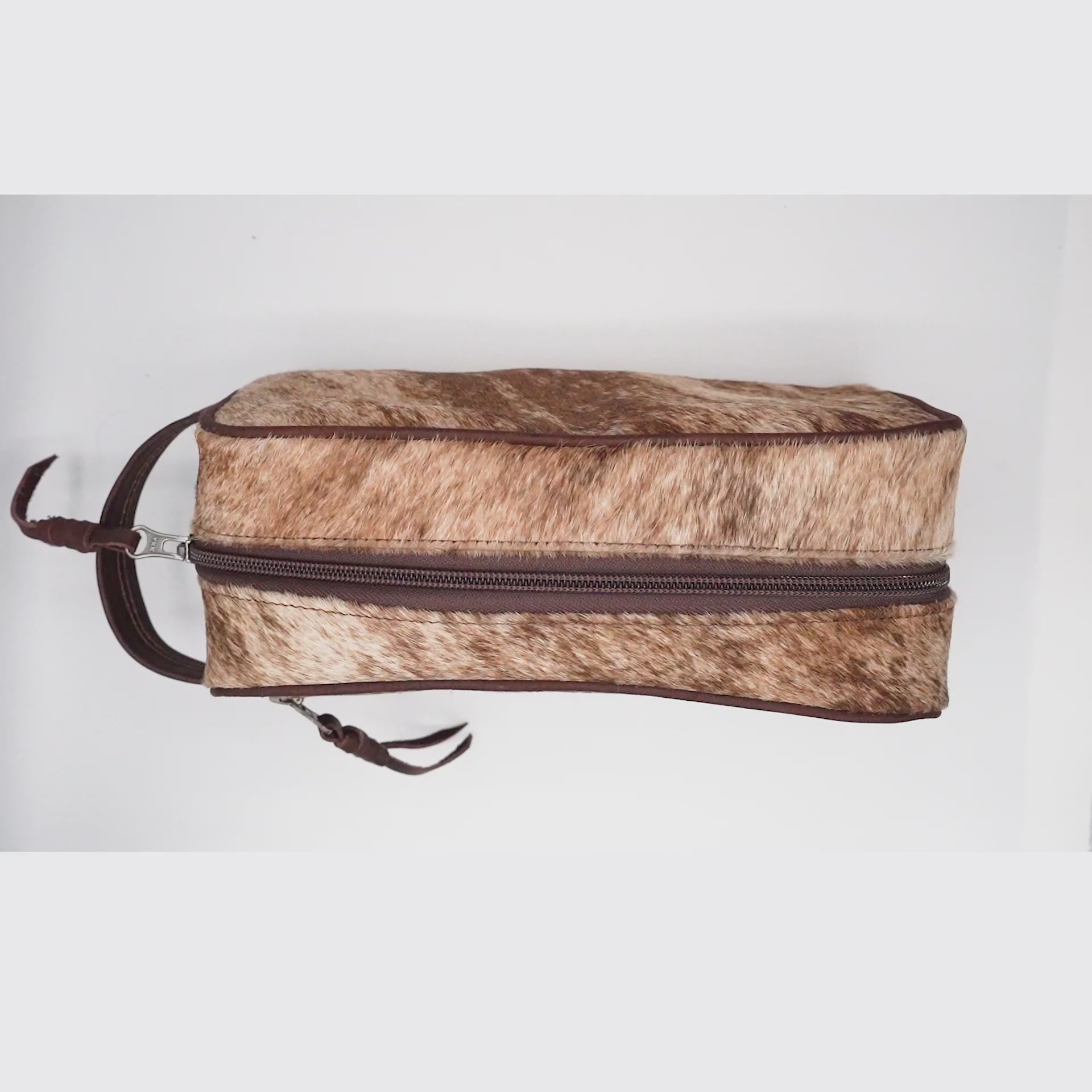 Load video: Toiletry Bag with authentic cowhide product details